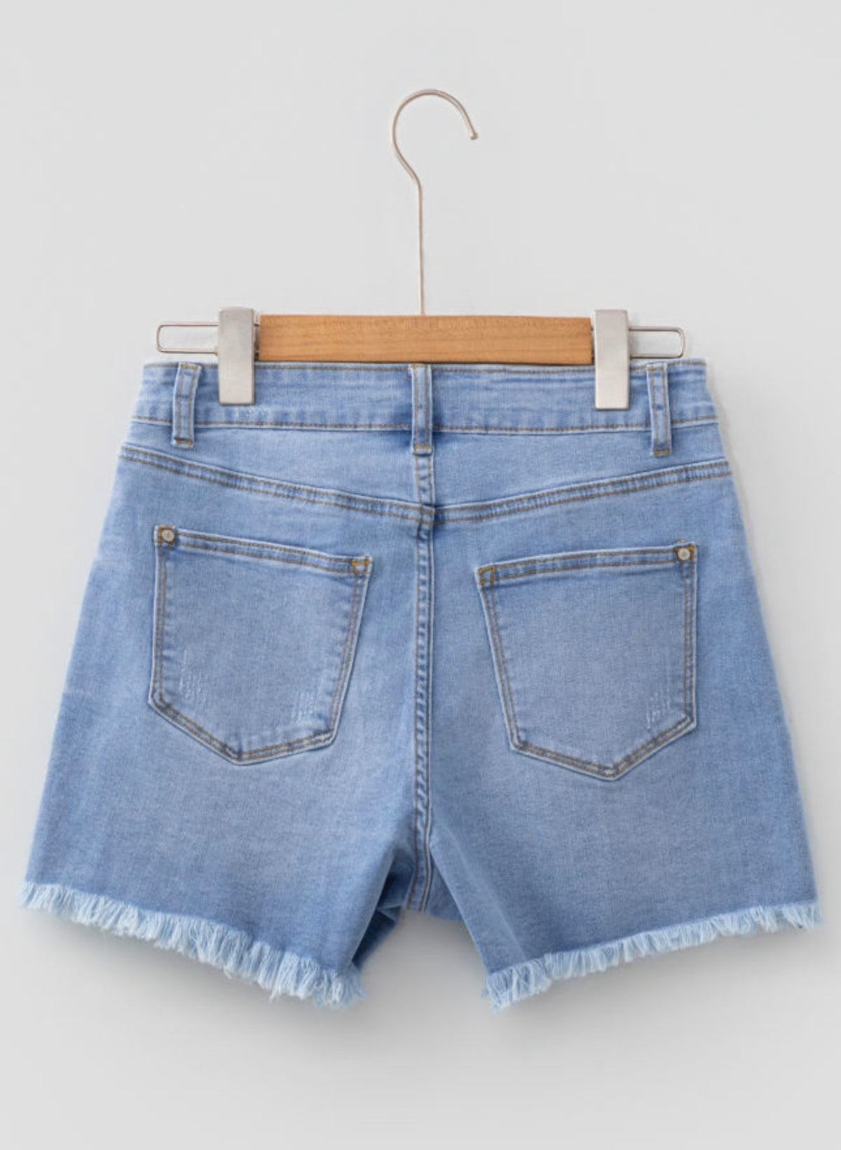 Asymmetric Raw Hem Jean Shorts